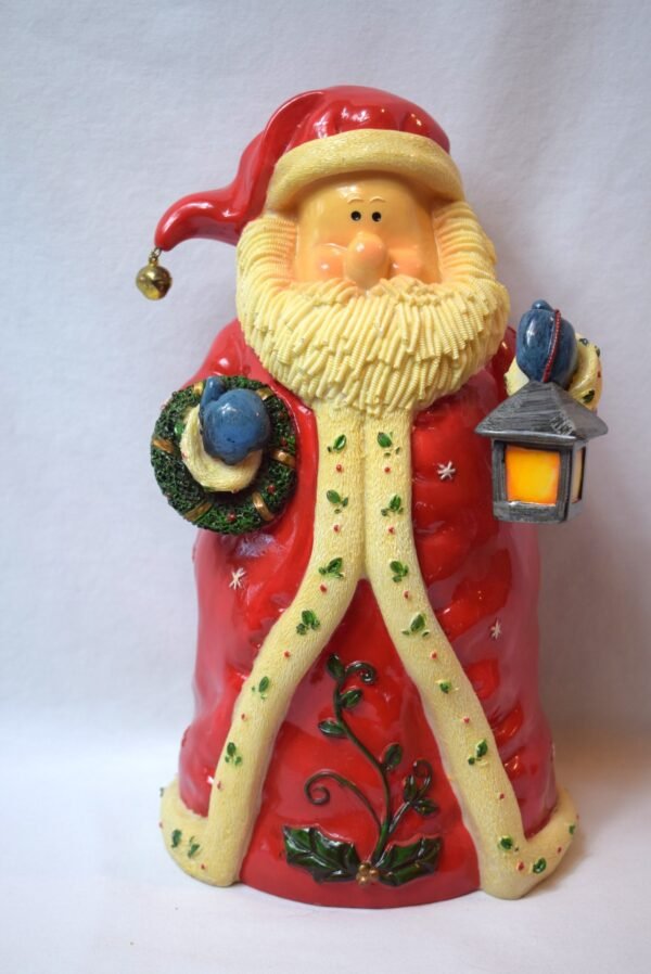 Vintage Resin 11 Inch Santa Claus Figure Holding Lantern and Wreath