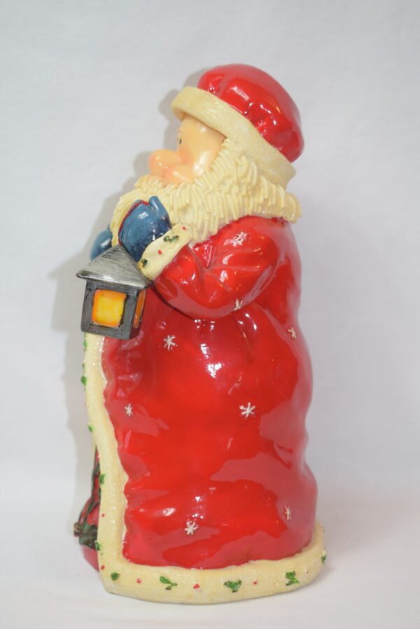 Vintage Resin 11 Inch Santa Claus Figure Holding Lantern and Wreath - Image 2